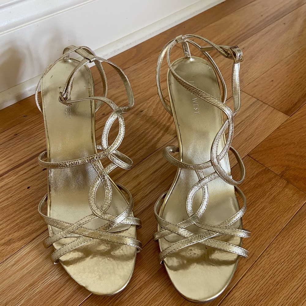 Nine West. Gold Sandals. 4 inch heel. Size 81/2
